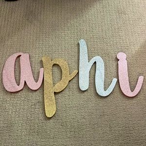 Silve, Gold, and pink Aphi wall art. Used once.